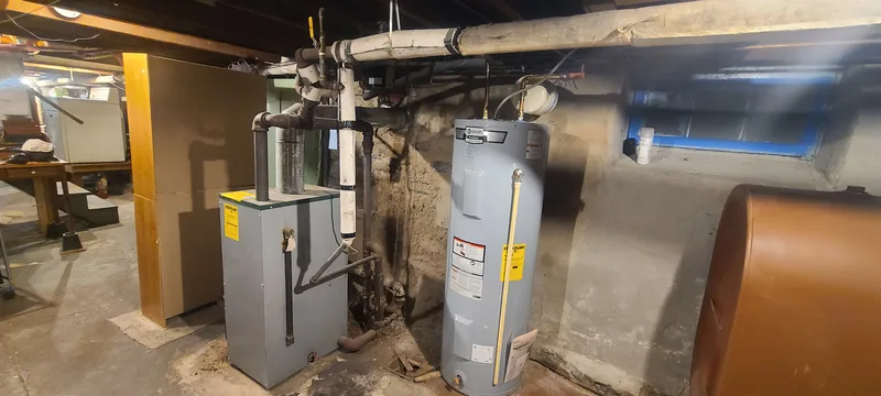 Basement: boiler, hot water heater, and oil tank